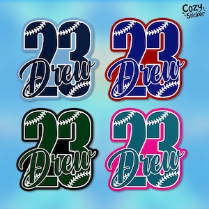 May include: Four different color variations of a baseball-themed sticker with the number 23 and the name "Drew" written in a cursive font. The sticker is available in blue, red, green, and pink.