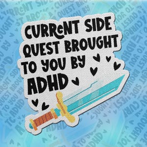 May include: White patch with the text "CURRENT SIDE QUEST BROUGHT TO YOU BY ADHD" in black with a blue and yellow sword graphic and hearts.