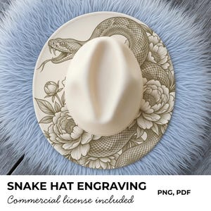 May include: A cream-coloured fedora hat featuring a detailed engraving of a snake and floral design. The hat is set against a light blue, fluffy background. The text "SNAKE HAT ENGRAVING" is visible at the bottom.