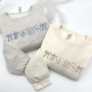 Embroidered Nurse Sweatshirt, Nurse Coquette Hoodie, Nursing Student Sweatshirt, Embroidered Nursing Bow Sweatshirt, CNA Sweatshirt