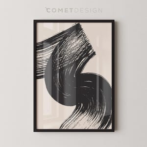May include: Abstract art print featuring a black brushstroke design on a light beige background. The brushstrokes are thick and bold, creating a dynamic and modern look.