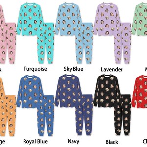 May include: Ten pairs of pajamas with different colored tops and bottoms. Each pair features a repeating pattern of a dog's face. The colors are pink, turquoise, sky blue, lavender, mint, orange, royal blue, navy, black, and cherry.