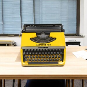 Máquina de escribir portátil, regalo de inauguración, Brother Duluxe 220 amarilla. ¡Compra en línea ahora!
