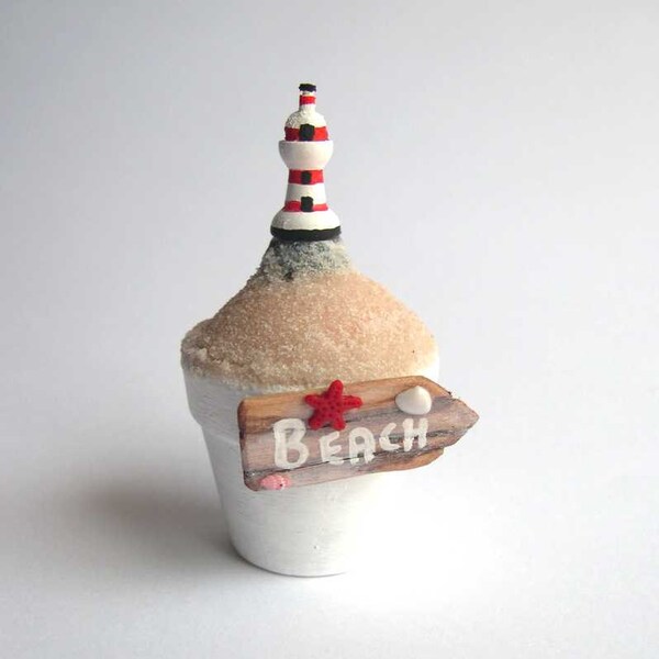 Decorative potted lighthouse white and red