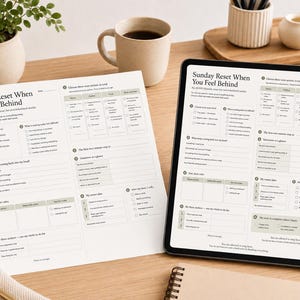 May include: A printed paper planner page and a digital tablet screen both displaying a Sunday Reset When You Feel Behind checklist. The layout includes sections for choosing tasks, identifying difficulties, and planning the upcoming week.
