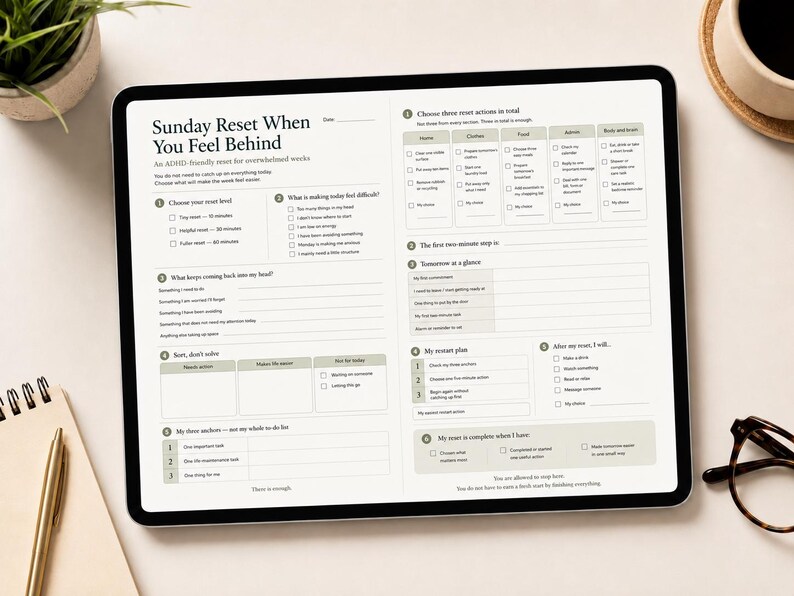 May include: A digital tablet displaying a Sunday Reset planner template with sections for choosing reset levels, identifying difficulties, and organizing tasks. The layout features checkboxes, numbered lists, and text fields in a clean, organized format.