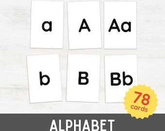 May include: Set of 78 alphabet flash cards with black letters on white cards. Each card features a lowercase letter, uppercase letter, and both letters together. The cards are arranged in three rows of six cards.