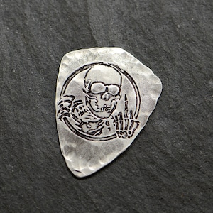 sterling silver guitar pick - shield shape with skeleton and middle finger - NicisPicks