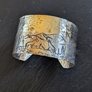 Wide bronze cuff bracelet gladiator style with mountains and wolves - medium wrist size