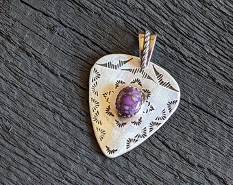 Mohave Purple charm pendant made from sterling silver in guitar pick shape