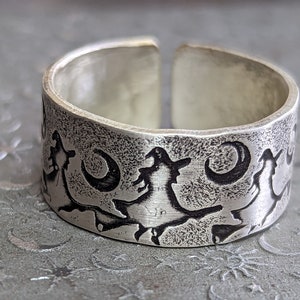 little witches sterling silver ring - adjustable ring with tiny witches on a broom