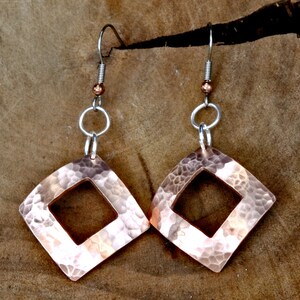 square copper drop earrings with hammered texture and window cut out image 5