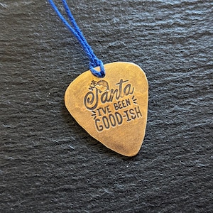 Bronze guitar pick Christmas ornament with Santa I have been goodish - pick is playable