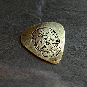 playable brass guitar pick with sugar skull - NicisPicks Original