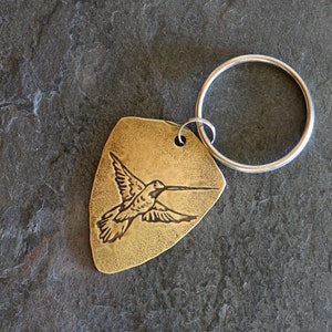 brass hummingbird guitar pick keyring - shield shaped guitar pick - NicisPicks