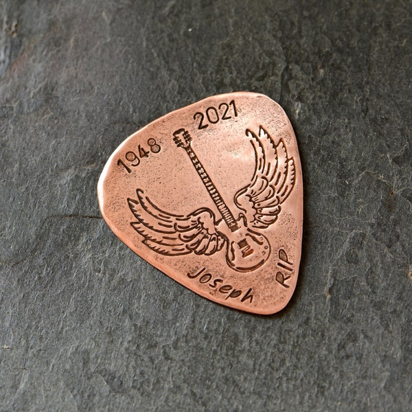 copper memorial guitar pick with winged guitar and small years and name - custom memory