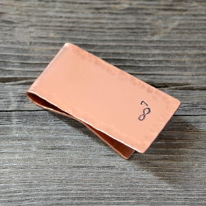 Copper money clip for 7th or copper Anniversary with a hand stamped infinity sign and a number 7