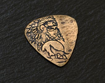 Copper guitar pick with coyote and southwestern vibe - playable
