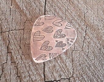 copper guitar pick with hearts and hammered texture on the back - PLAYABLE - anniversary gift