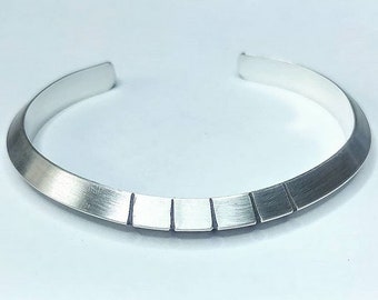 Mens sterling silver cuff bracelet in triangular shape with hand cut grooves