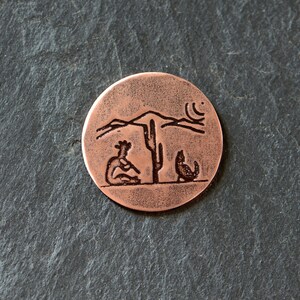 Copper golf ball marker with southwestern theme - kokopelli and cactus golf ball marker