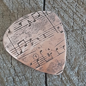 Limited Edition Copper guitar pick - playable - music notes on front - NicisPicks Original - Collectible