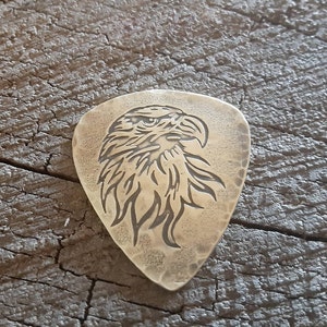 handmade brass guitar pick - playable with eagle head