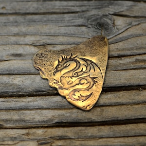 Bronze shark tooth guitar pick with dragon - handmade and playable