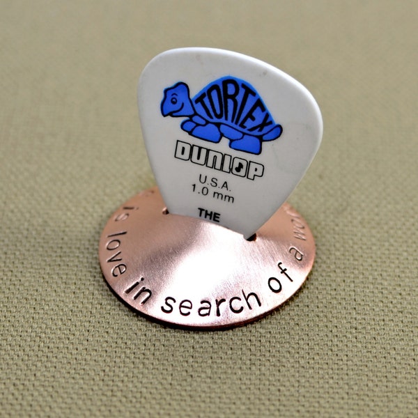 Copper guitar pick stand rocking with "music is love in search of a word "- GPS714