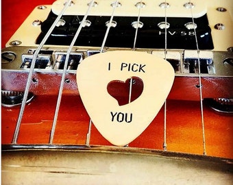 Playable I Pick You bronze guitar pick perfect for valentines day with cut out heart to improve the grip