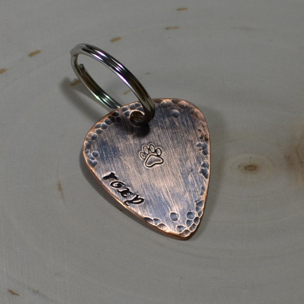 Guitar pick dog tag with rustic brushed patina and hammered texture