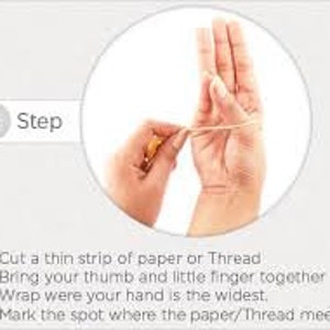 May include: A hand with a thin strip of paper or thread wrapped around it. The paper or thread is wrapped around the hand where it is the widest. The thumb and little finger are touching. The paper or thread is marked where it meets.