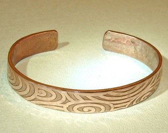 copper cuff bracelet with swirls