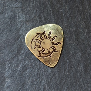 brass guitar pick with sun and moon - playable - NicisPicks