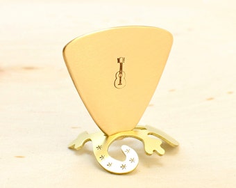 Triangular bronze bass guitar pick with musical inspiration - GP994