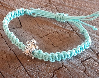 Light blue hemp anklet or bracelet with small tortoise bead