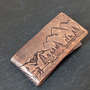 Copper money clip with mountains