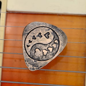 Yin Yang with Hearts imprinted on Copper Guitar Pick