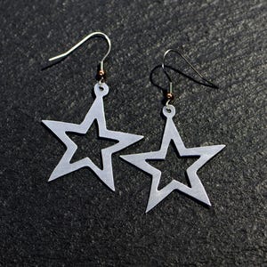 Silver star drop earrings hand cut