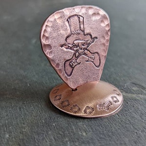 Copper guitar pick - playable with skull and guitars - comes with pictured stand - guitar pick holder - NicisPicks