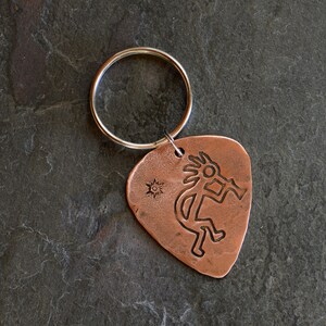 copper guitar pick key chain with Kokopelli - handmade and playable guitar pick