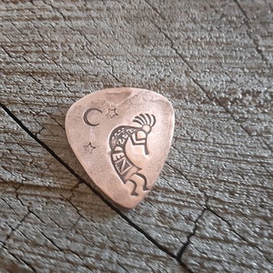 Copper guitar pick with Kokopelli - collectible artisan guitar pick