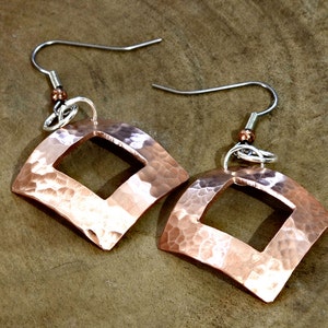 square copper drop earrings with hammered texture and window cut out image 2