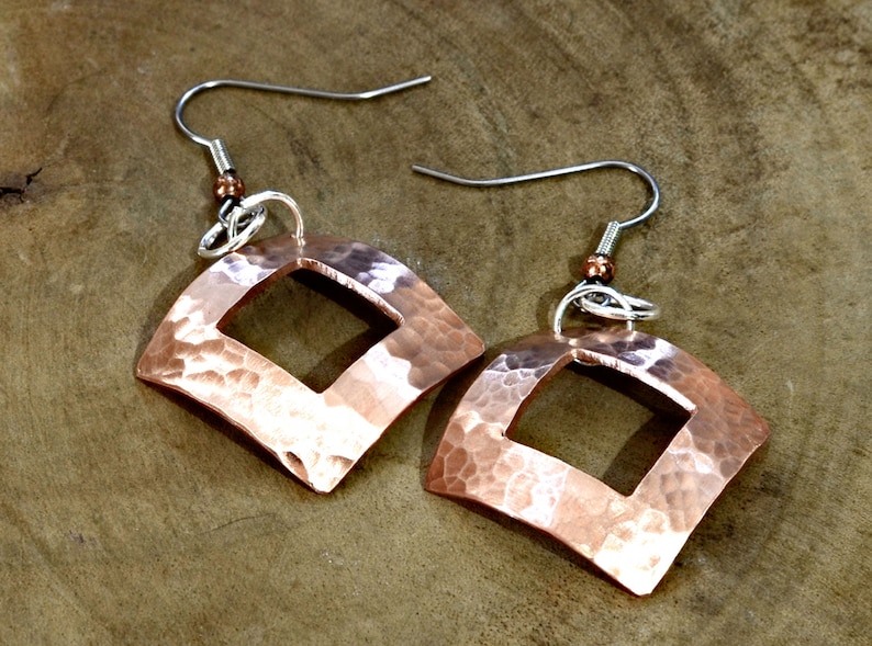 square copper drop earrings with hammered texture and window cut out image 2