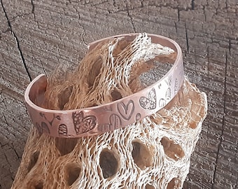 copper cuff bracelet with hearts and hammered texture inside -7th anniversary - copper anniversary