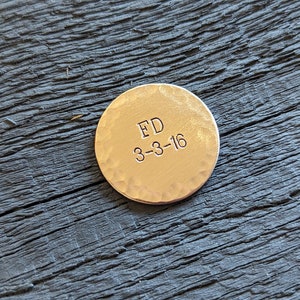 Custom bronze golf ball marker with date and initials