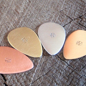 mixed bag of 4 different metal guitar picks tear drop shape - playable