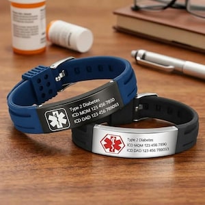 May include: Two medical alert bracelets with silicone bands in blue and black. Each features a metal plate engraved with a red or white Star of Life symbol, the text Type 2 Diabetes, and contact numbers for ICD MOM and ICD DAD 123 456 7890.