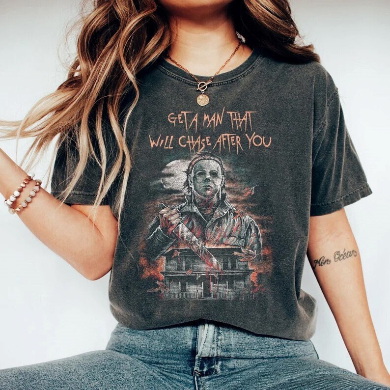 Discover Michael Myers Get A Man That Will Chase After You Sweatshirt, Vintage Michael Myers Shirt, Horror Movie Shirt, Michael Myers Horror Sweate