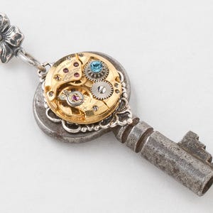 Vintage Skeleton Key Necklace with Gold Watch Movement & Blue Crystal, Silver Flower, Filigree Victorian Key Pendant Steampunk Jewelry Gift image 1